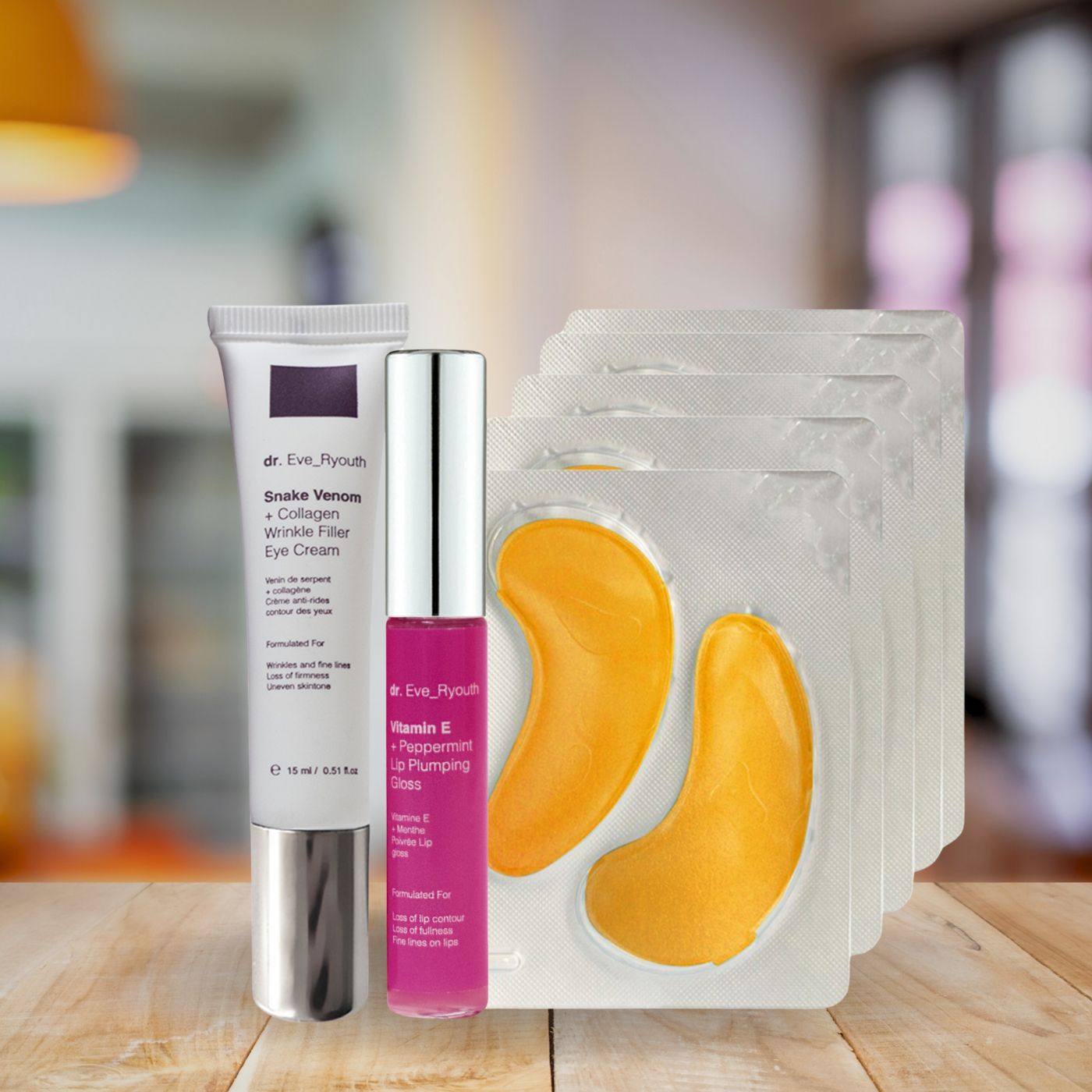 Set mit Augencreme, Lipgloss und Augenpads. Augencreme-Tube, Lipgloss-Flakon und 6 Augenpads in Blistern.