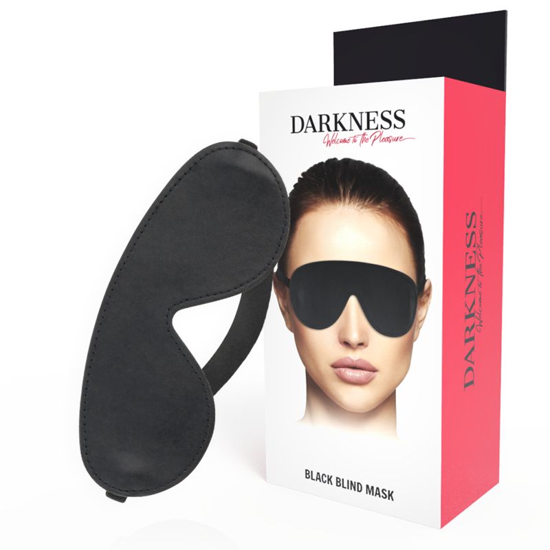 Schwarze Augenmaske neben Verpackung. Verpackung mit Produktbild und Schriftzug "DARKNESS".