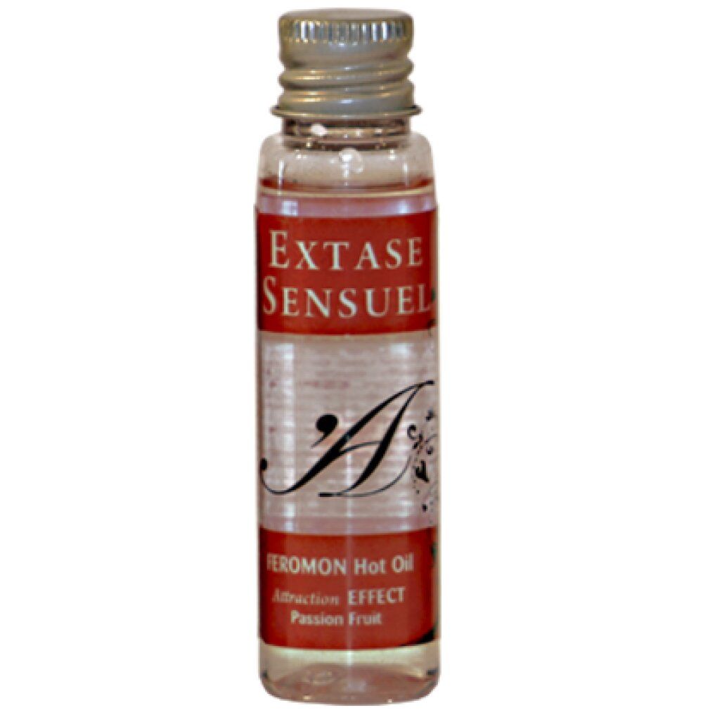 Kleine Flasche mit durchsichtigem Öl, Etikett mit 'EXTASE SENSUEL' und 'FEROMON Hot Oil'.