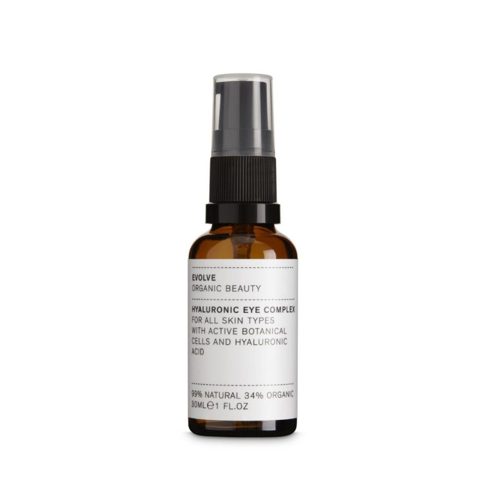 Braune Glasflasche mit schwarzem Sprühkopf. Auf dem Etikett steht: EVOLVE ORGANIC BEAUTY, Hyaluronic Eye Complex. Für alle Hauttypen.