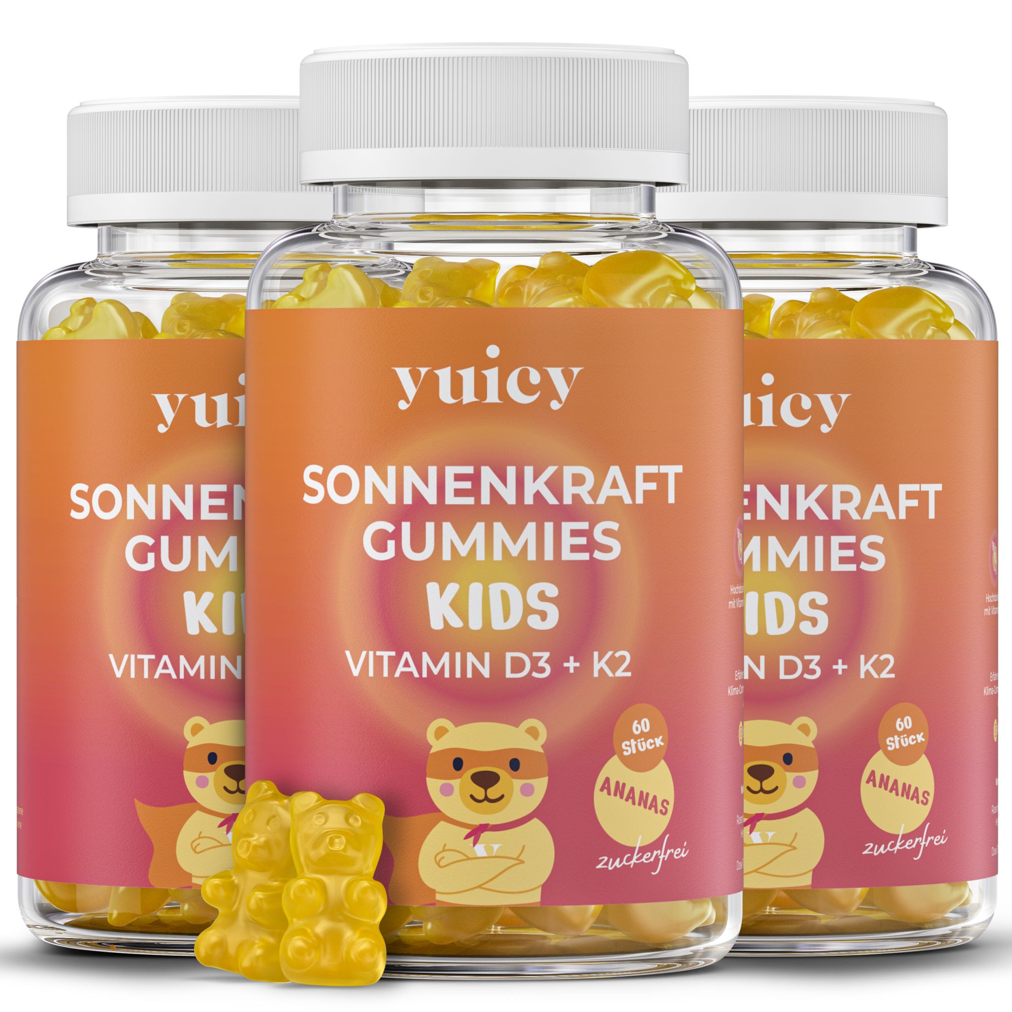 Drei Flaschen yuicy® Sonnenkraft Gummies. Aufschrift: Vitamin D3 + K2. Gelbe Gummibärchen daneben. Text: 60 Stück, zuckerfrei.