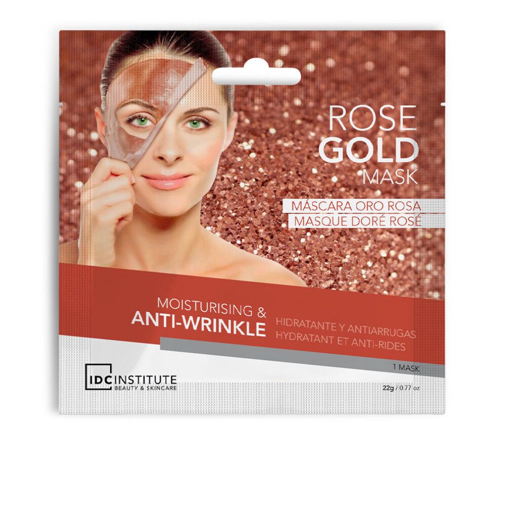 Gesichtsmaske Rose Gold, Anti-Falten-Effekt. Frau mit Maske auf der Hälfte des Gesichts. Verpackung mit Produktnamen und Marke.