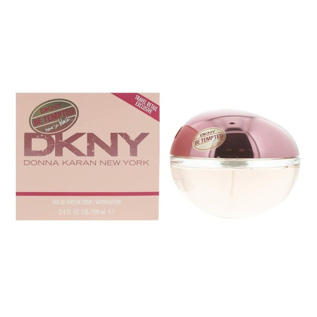 Flakon und Verpackung. Flakon mit rosa Deckel. DKNY Be Tempted-Logo auf beiden. Travel Retail Exclusive.