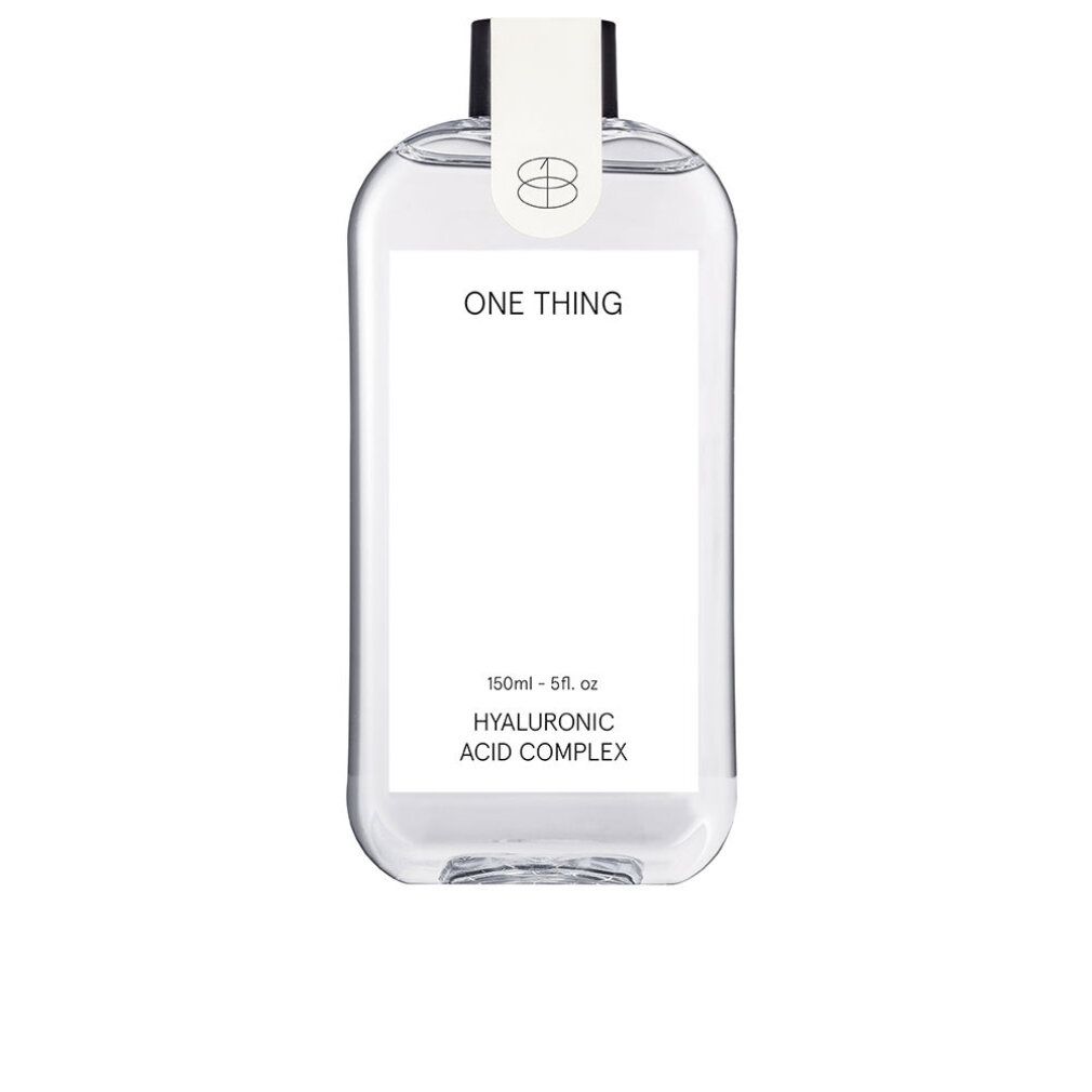 Klare Flasche mit weißem Etikett. Aufschrift: ONE THING, Hyaluronsäure-Komplex. Schwarzer Verschluss.