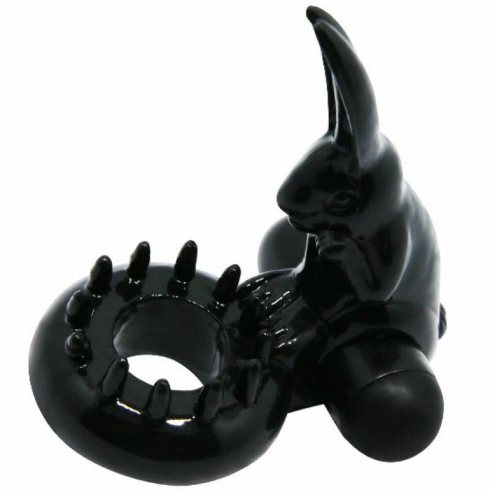 Schwarzer Vibrationsring mit Hasen-Design. Ring mit Noppen, Hase mit Ohren. Glänzende Oberfläche.