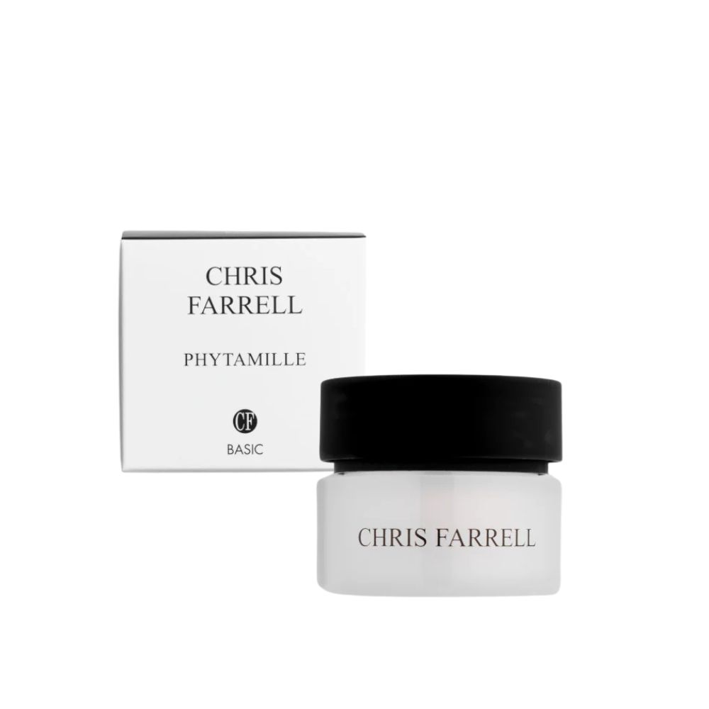 Creme-Tiegel mit schwarzem Deckel und weißer Verpackung. Auf dem Tiegel steht "CHRIS FARRELL". Auf der Verpackung steht "CHRIS FARRELL PHYTAMILLE".
