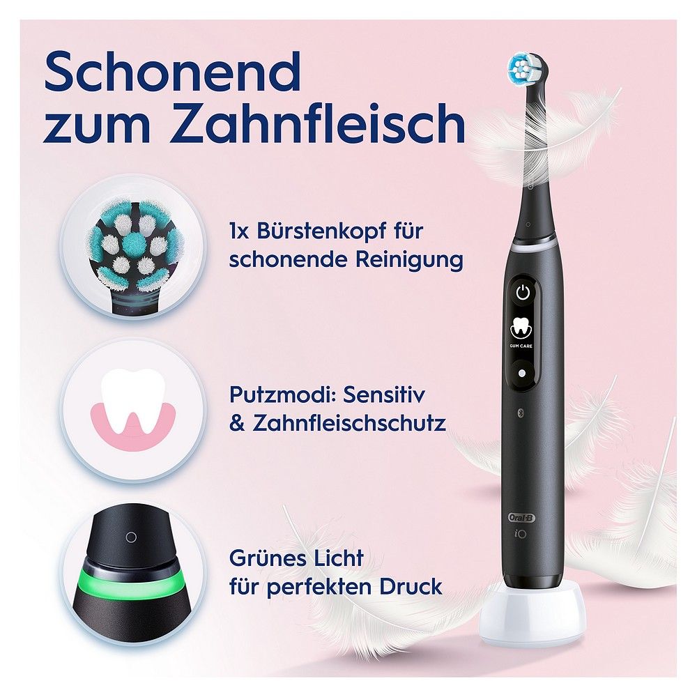 Schwarze elektrische Zahnbürste iO 6 mit Ladestation, Anzeige für perfekten Druck und Feder-Symbolen.