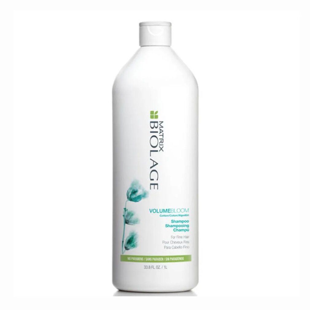 Weiße Shampoo-Flasche mit grünem Etikett. Aufschrift: Matrix Biolage VolumeBloom Shampoo. Für feines Haar. 1L.