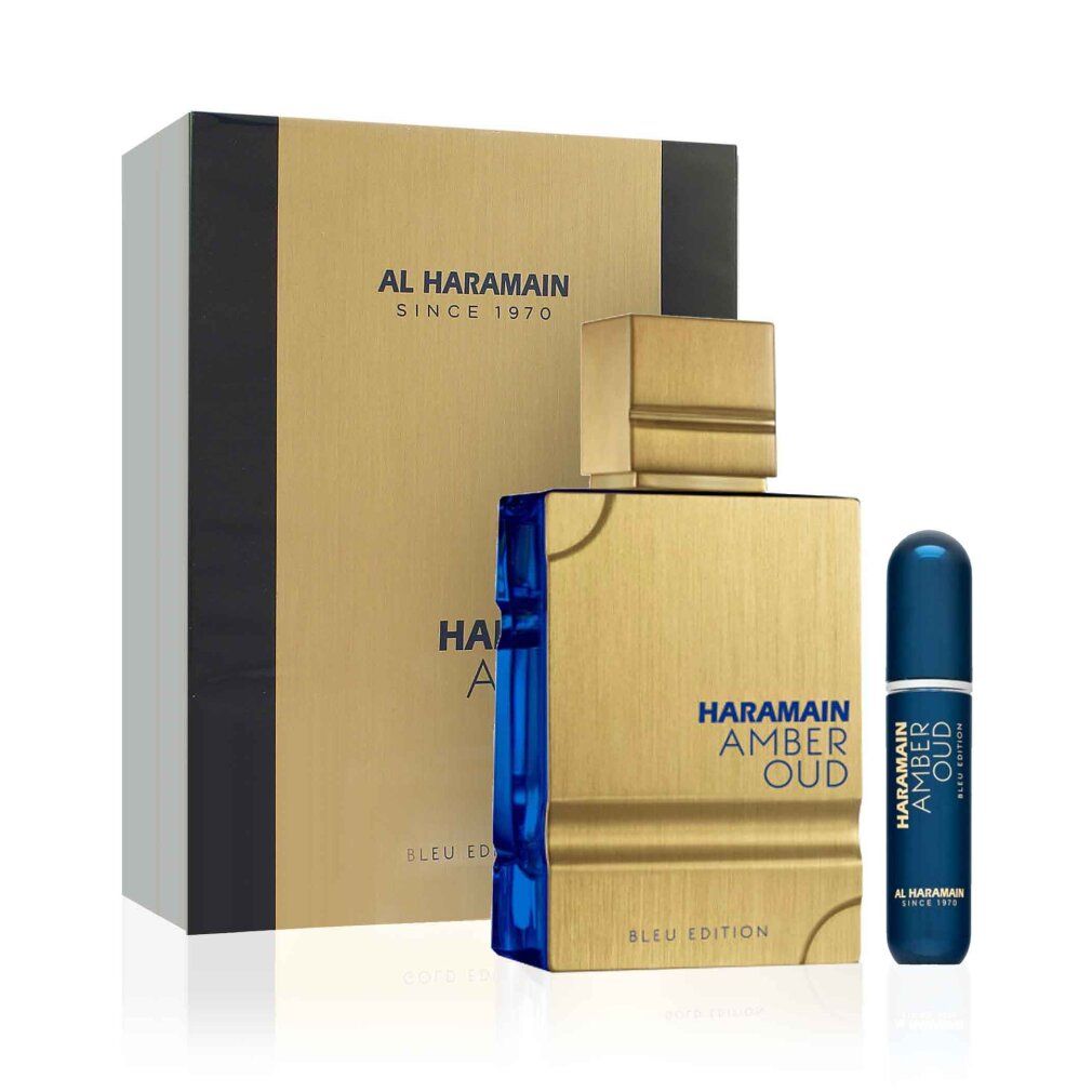 Goldfarbener Flakon mit blauen Elementen, Verpackung und Zerstäuber. Aufschrift: HARAMAIN AMBER OUD BLEU EDITION. Marke: AL HARAMAIN.