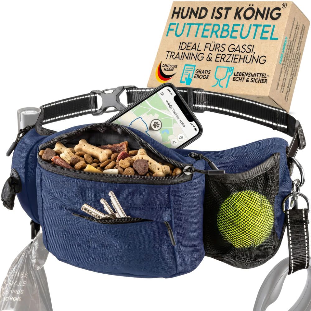 Blaue Bauchtasche mit mehreren Fächern, Leckerlis, Schlüssel, Ball und Smartphone. Schwarzer Gurt mit Schnalle. Verpackung mit Produktname.