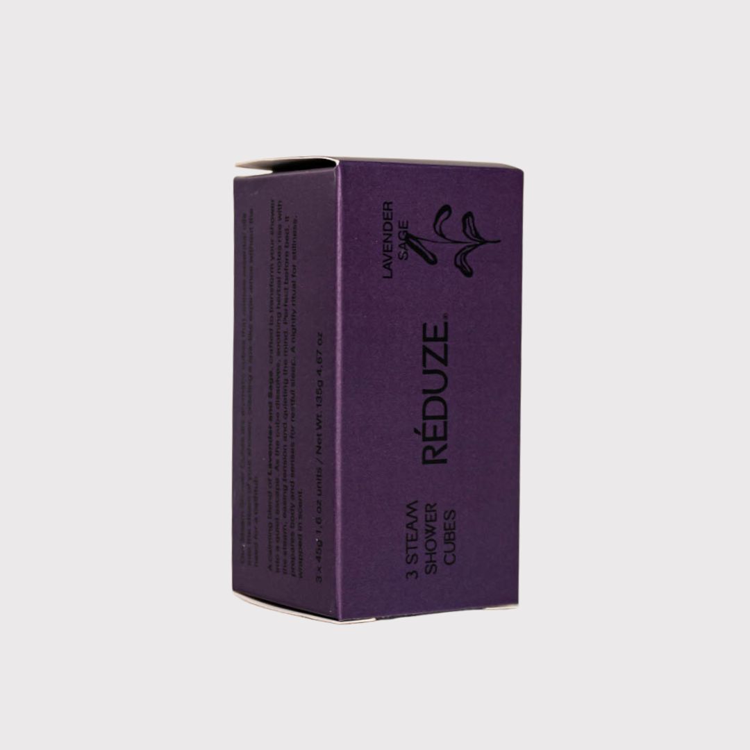 Lila Schachtel mit RÉDUZE-Logo und Text. Aufschrift: 3 Steam Shower Cubes.