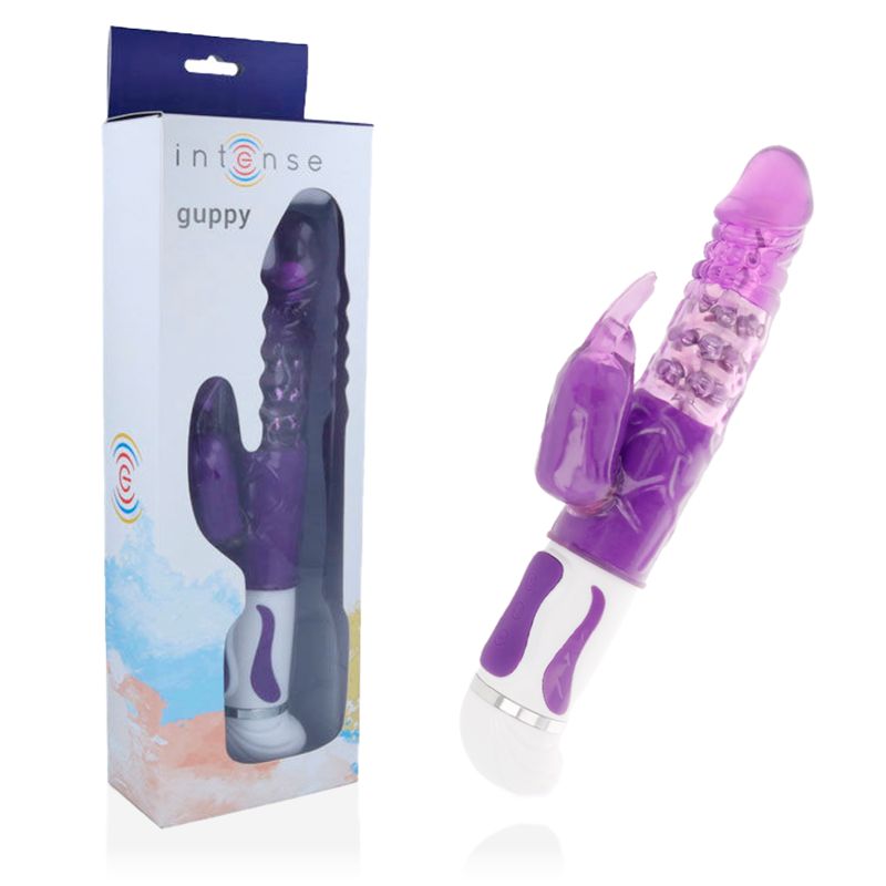 Intense Guppy Vibrator in Verpackung. Lila Vibrator mit Hasenohren. Weißer Griff. Verpackung mit Produktbild.