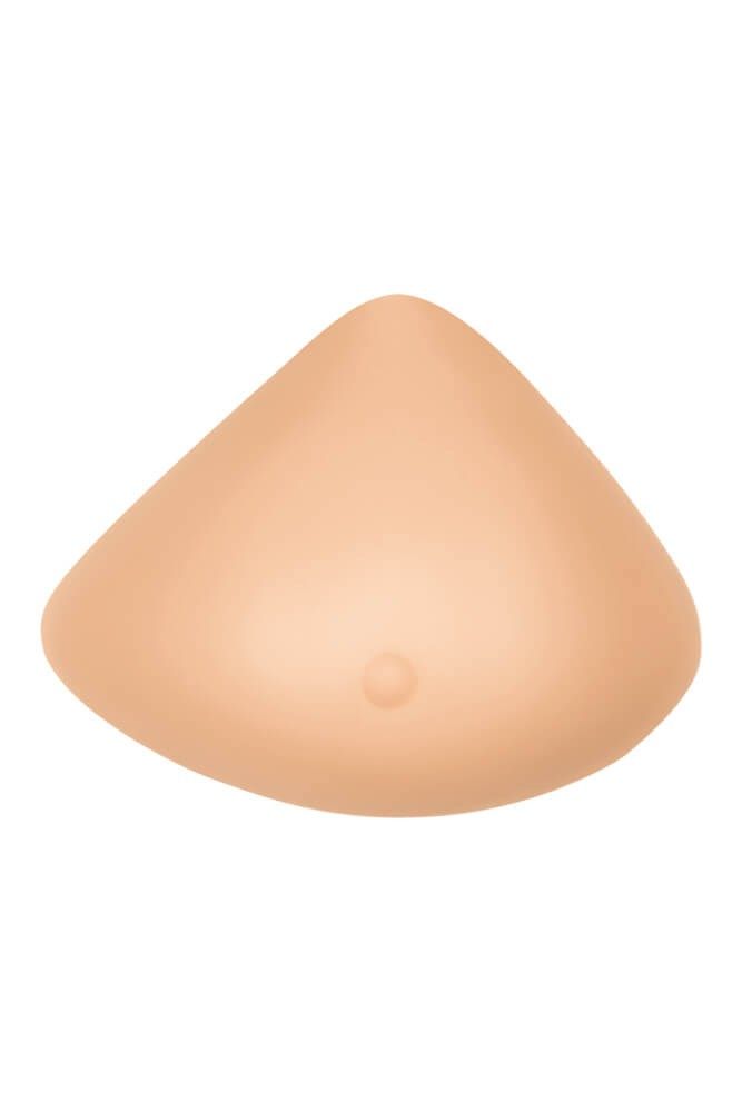 Brustprothese in mittlerer Brustform. Hautfarbenes Silikon, tropfenförmig. Kleine Erhebung mittig.