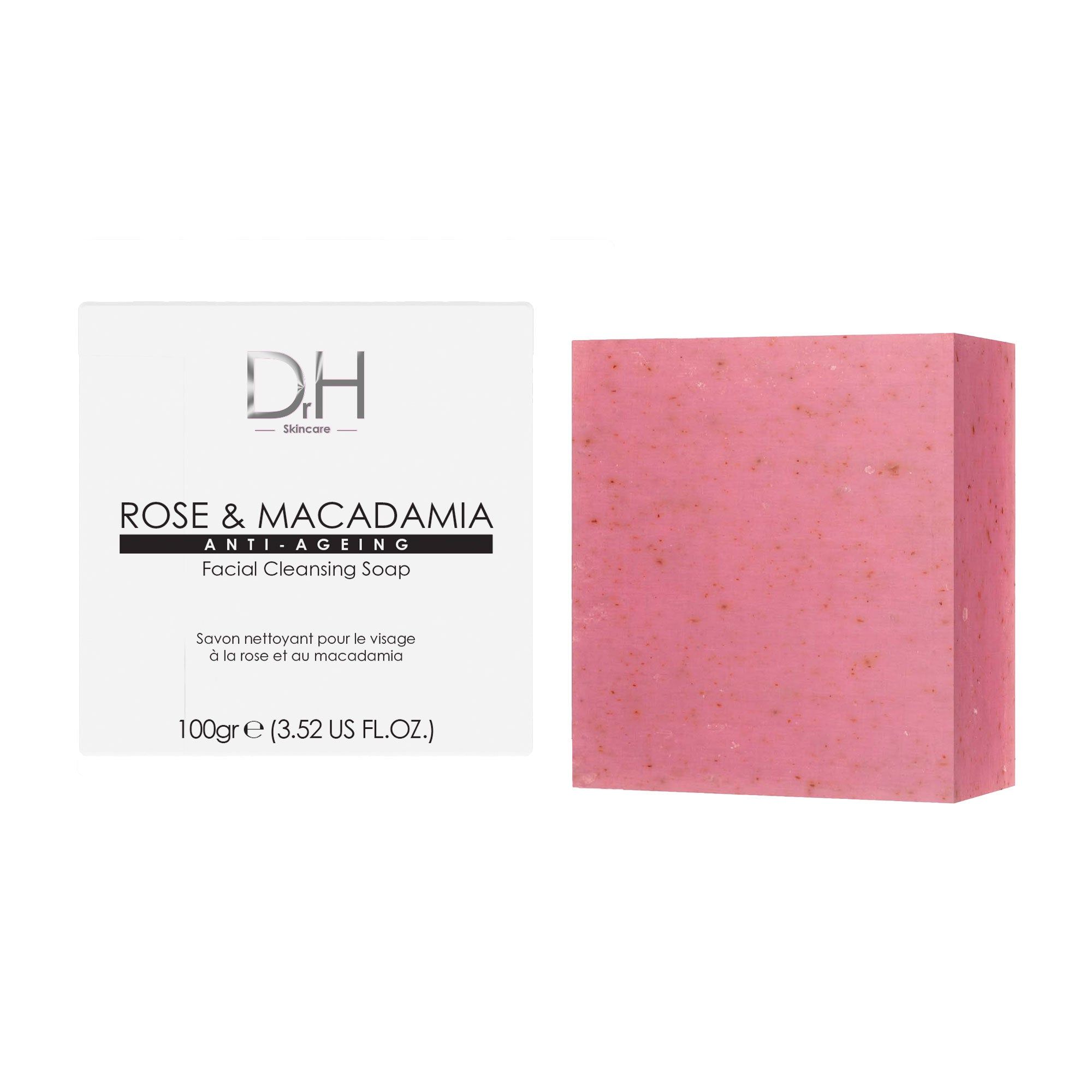 Rosa Seife und Verpackung. Seife rechteckig, Verpackung weiß. Aufschrift: Rose & Macadamia, Facial Cleansing Soap.