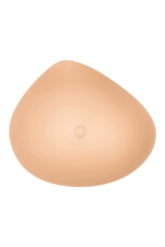 Brustprothese in Hautfarbe. Tropfenförmig mit kleiner Erhebung. Vollbrustform.