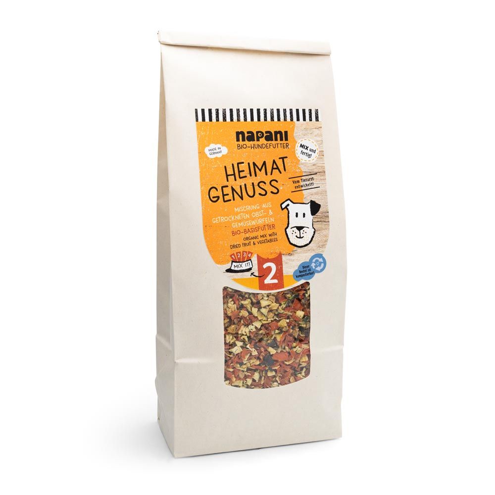Papiertüte mit Produktbezeichnung und Fenster. Aufdruck: napani Bio-Basisfutter "Heimat Genuss" für Hunde. Sichtbares Futter.
