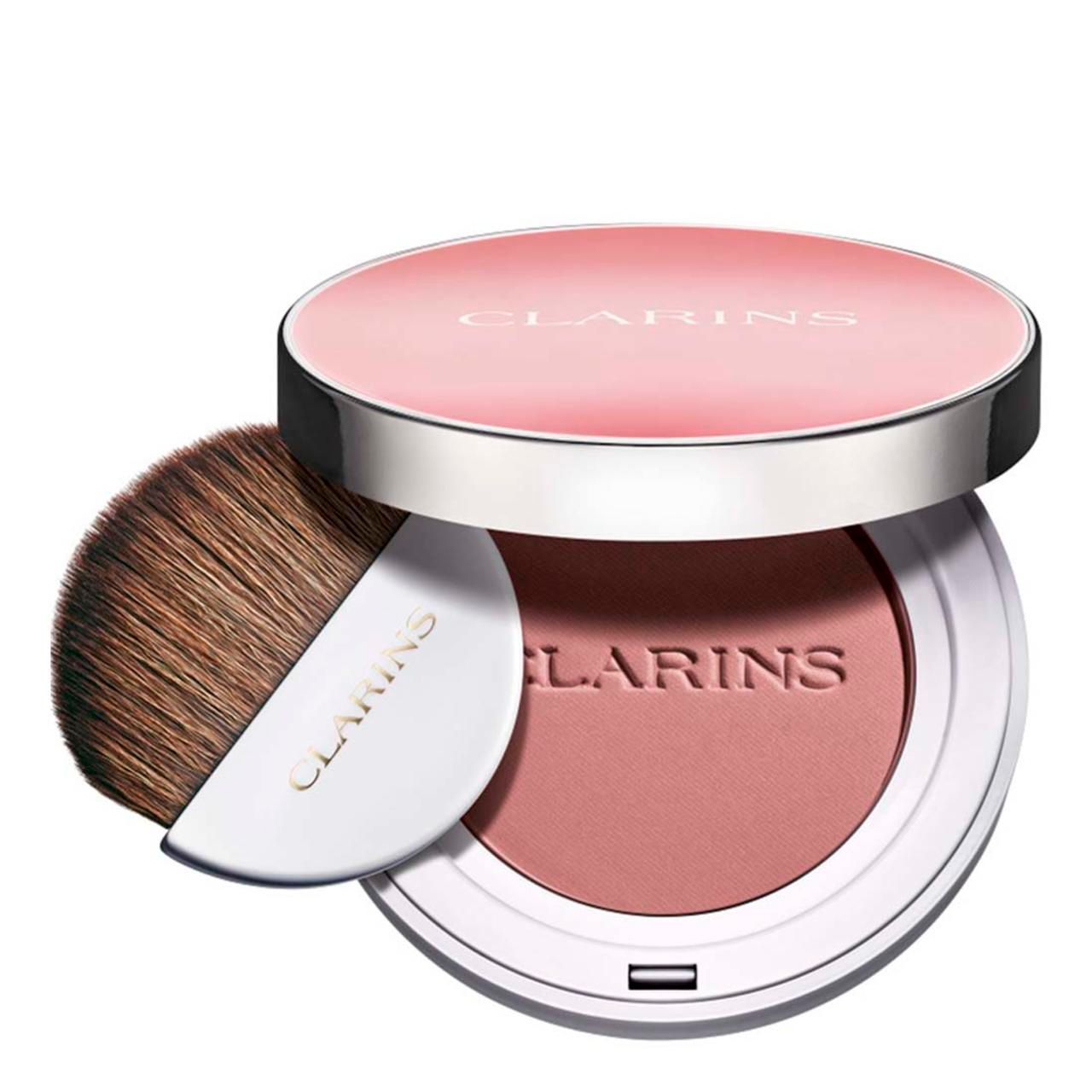 Runder Rouge-Kompaktpuder mit Pinsel. Deckel mit Schriftzug CLARINS. Puder in Rosa. Pinsel mit weißem Griff. Aufschrift CLARINS.