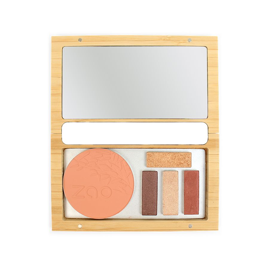 Geöffnete Bambusbox mit Spiegel, Puder und Lidschatten. Verschiedene Farbtöne. Natürliche Holzfarbe.