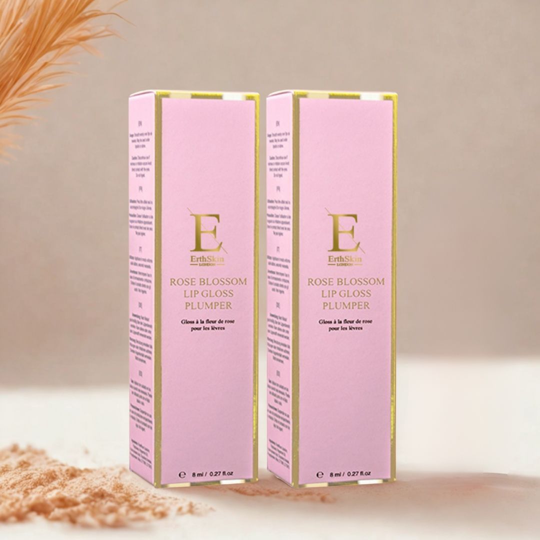 Zwei rosa Verpackungen mit goldfarbenen Akzenten. Auf jeder steht "ErthSkin London Rose Blossom Lip Gloss Plumper".