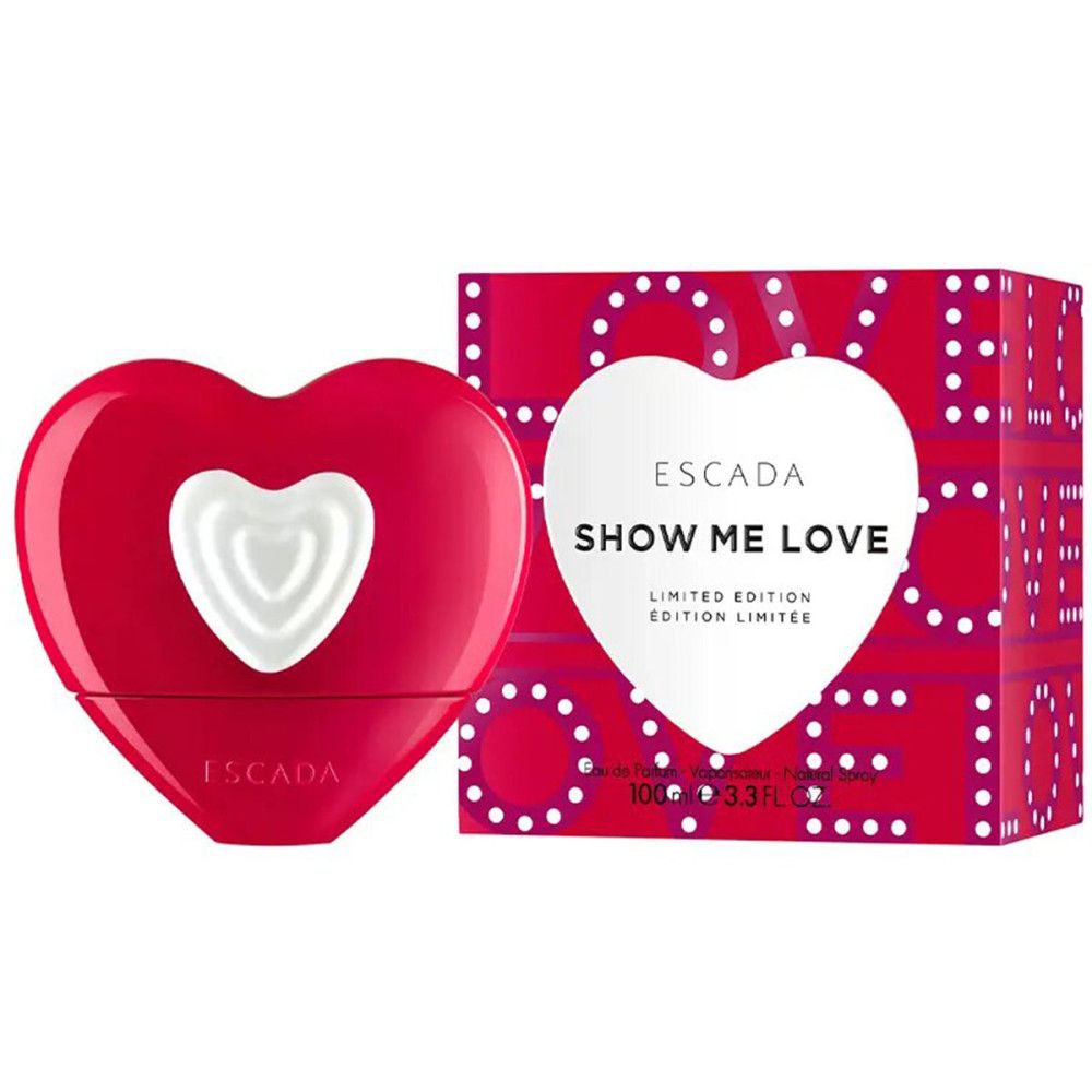 Roter Flakon in Herzform mit weißem Herz. Daneben die Verpackung. Text: ESCADA, SHOW ME LOVE.