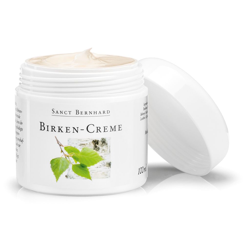 Weißes Tiegel mit "Sanct Bernhard Birken-Creme"-Aufdruck. Deckel daneben. Birkenzweig-Illustration.