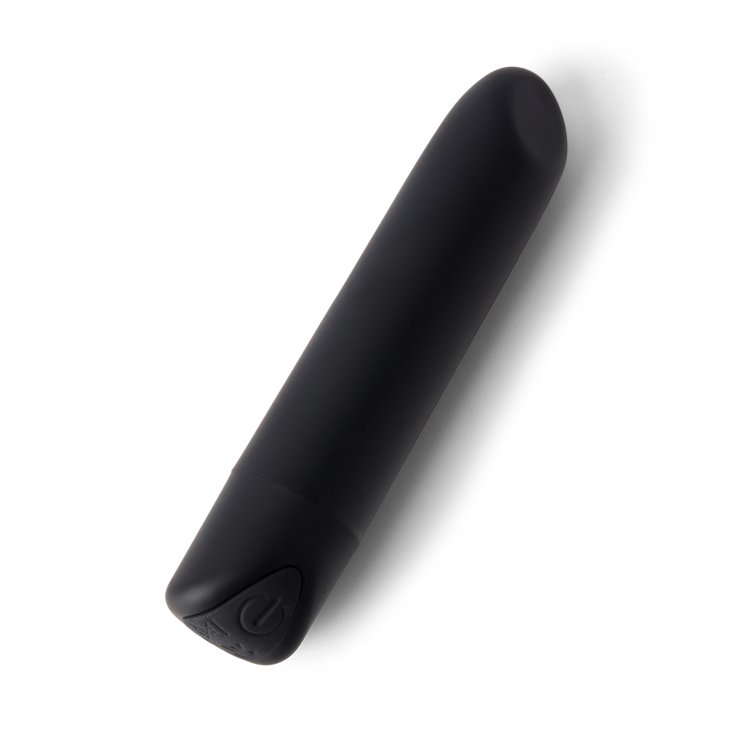 Schwarzes, zylindrisches Wellness-Produkt. Mit Power-Taste. Auf weißem Hintergrund.