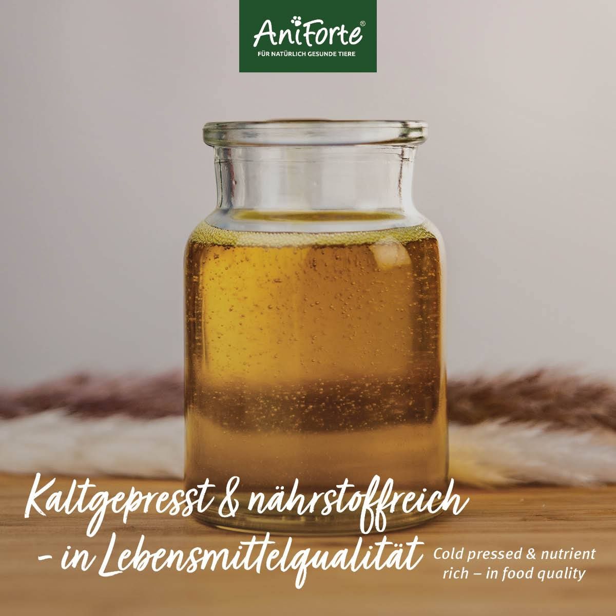 Glasbehälter mit gelbem Öl. Text: Kaltgepresst & nährstoffreich - in Lebensmittelqualität. AniForte Logo.