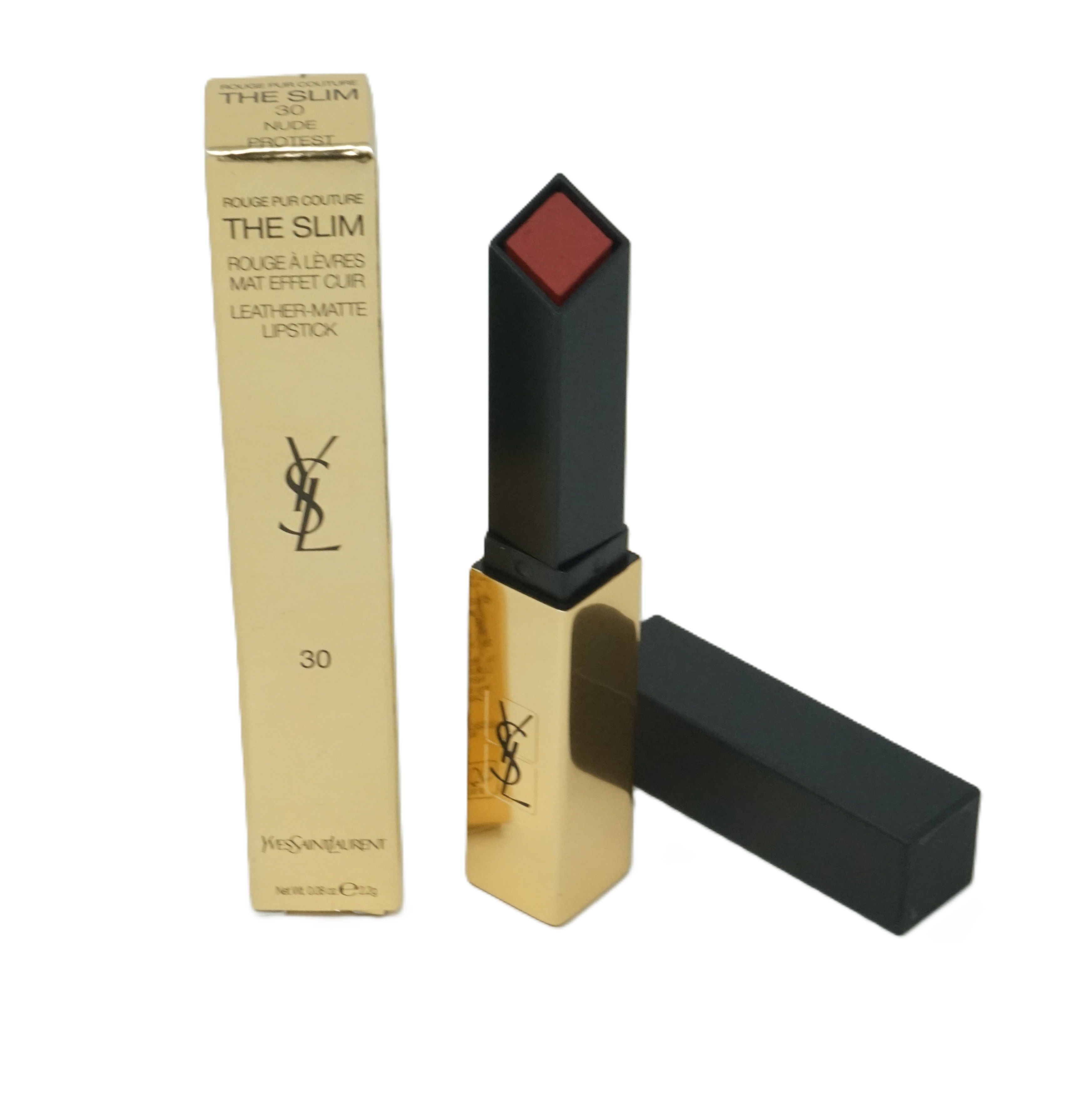 Lippenstift mit schwarzem Deckel und goldfarbenem Gehäuse, daneben die Verpackung. Logo und Produktbezeichnung.