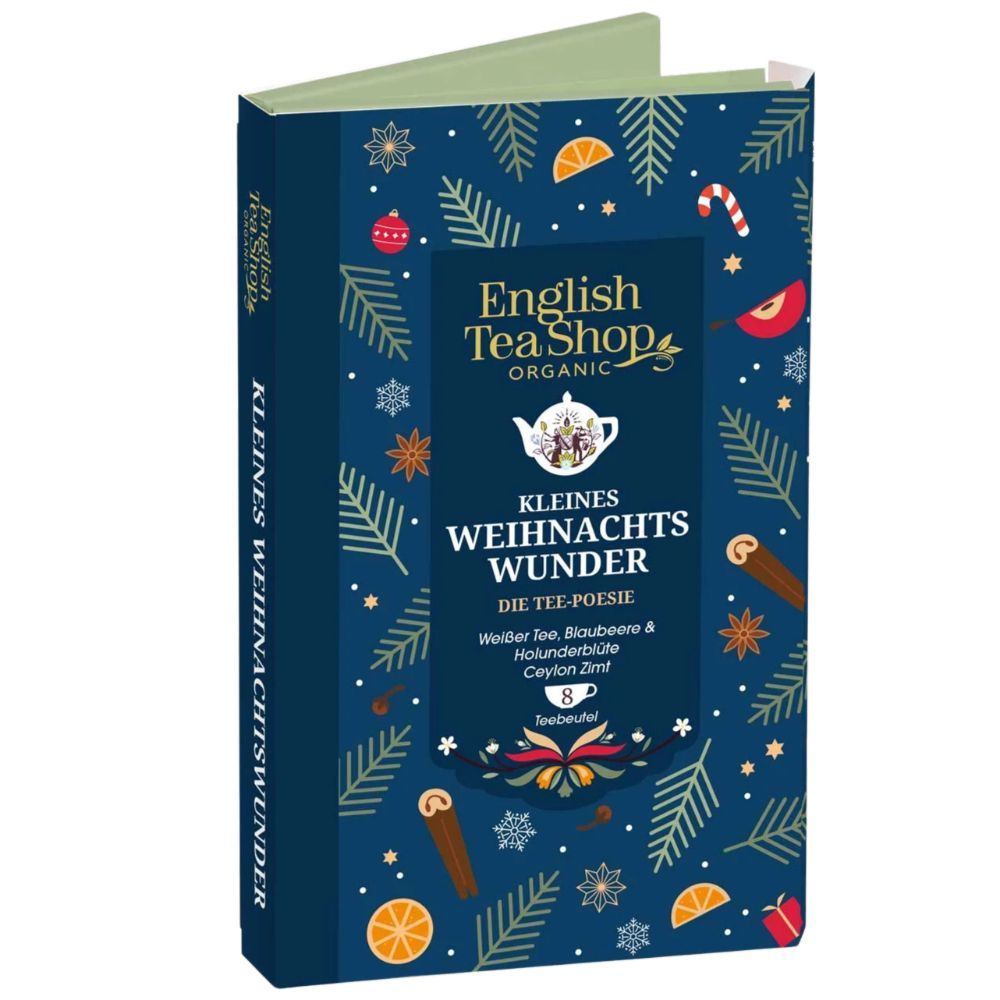 Geschenkbox mit blauem Deckel, verziert mit weihnachtlichen Motiven. Enthält Teebeutel. Aufschrift: Kleines Weihnachtswunder, English Tea Shop.
