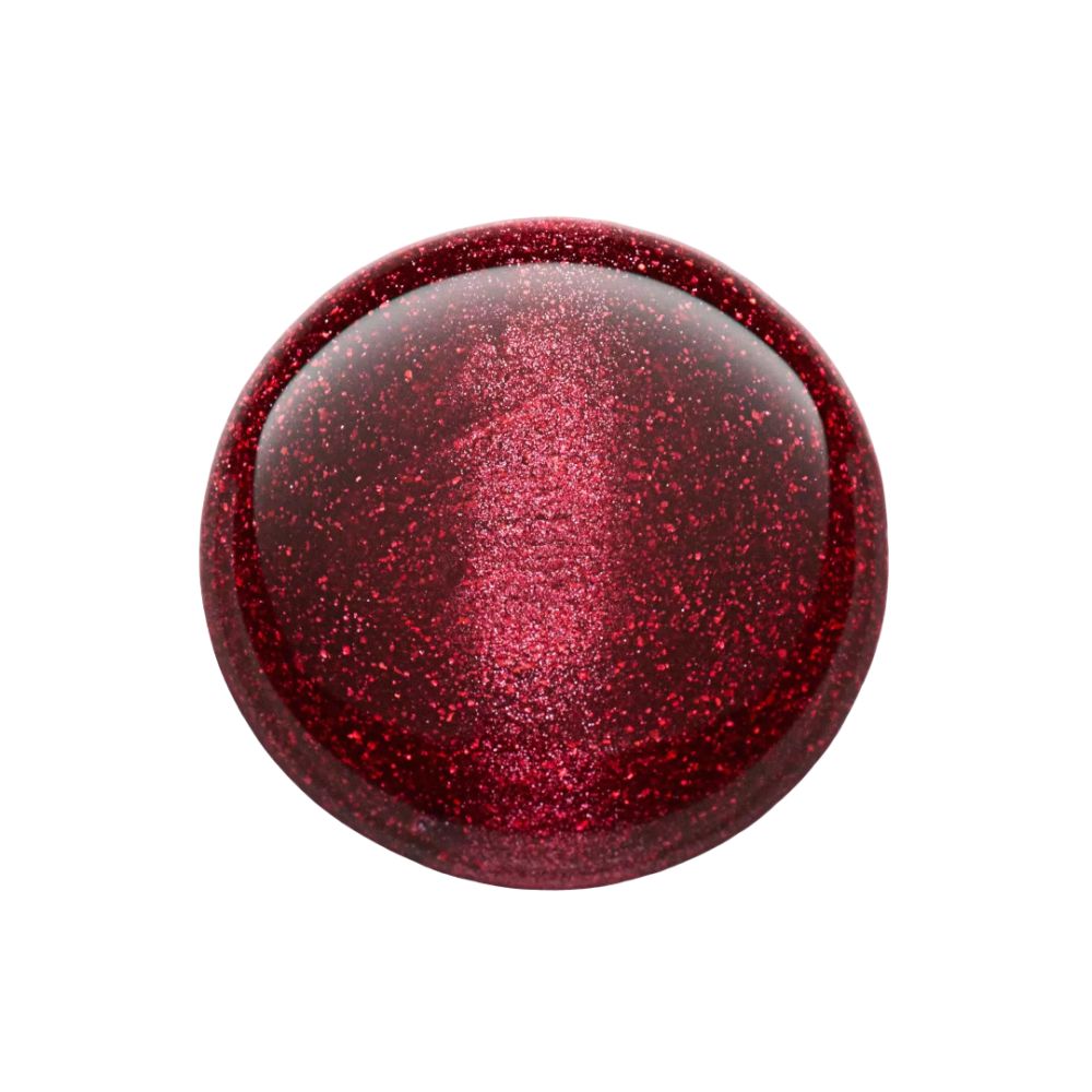 Runder Klecks Catrice Bold Magnetic Nagellack, rotbraun. Glänzende Oberfläche. Keine Verpackung oder Flasche sichtbar.