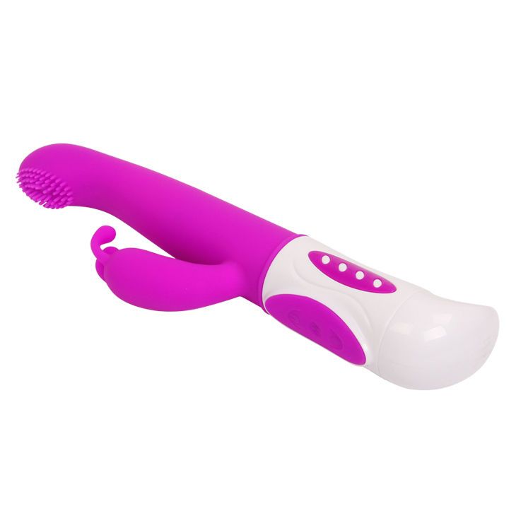Lila Vibrator mit weißem Griff. Geriffelte Spitze, Hasenohren-Design. Schräge Ansicht.