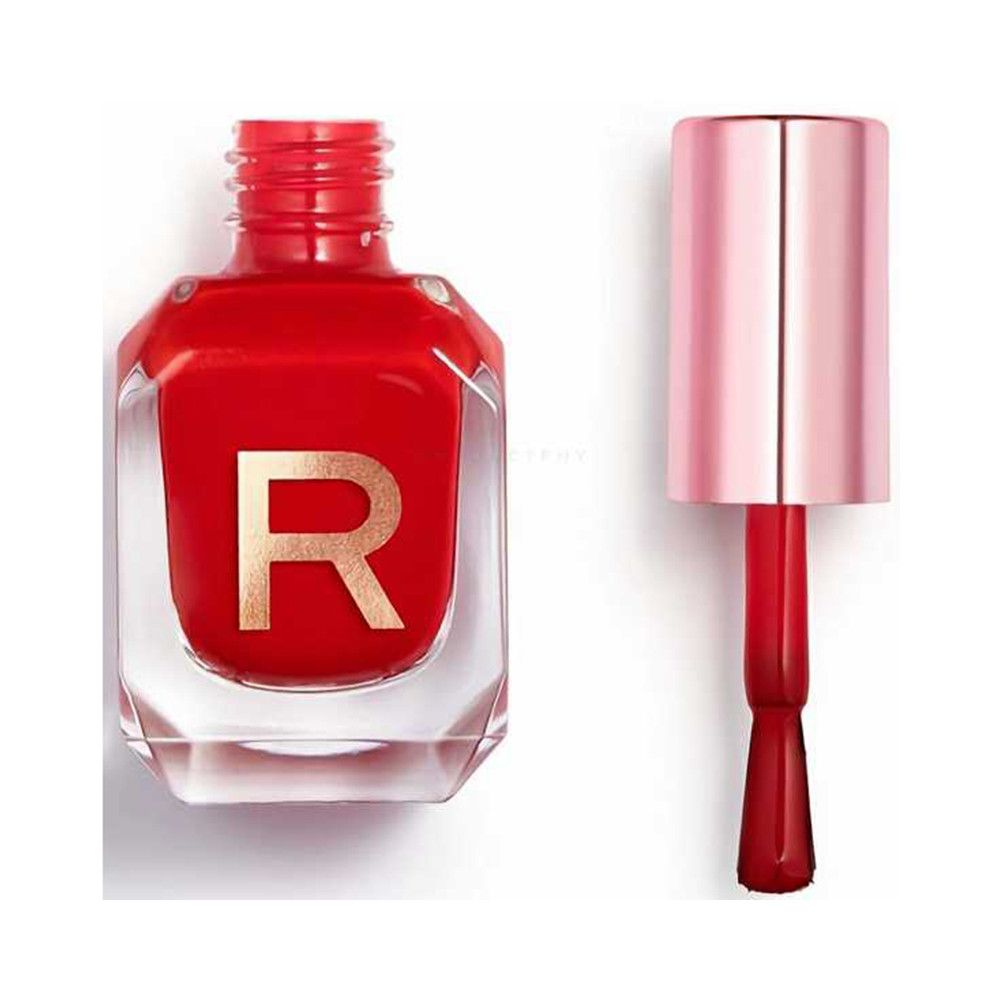 Roter Nagellack in einem transparenten Flakon mit rosa Verschluss und Applikator.