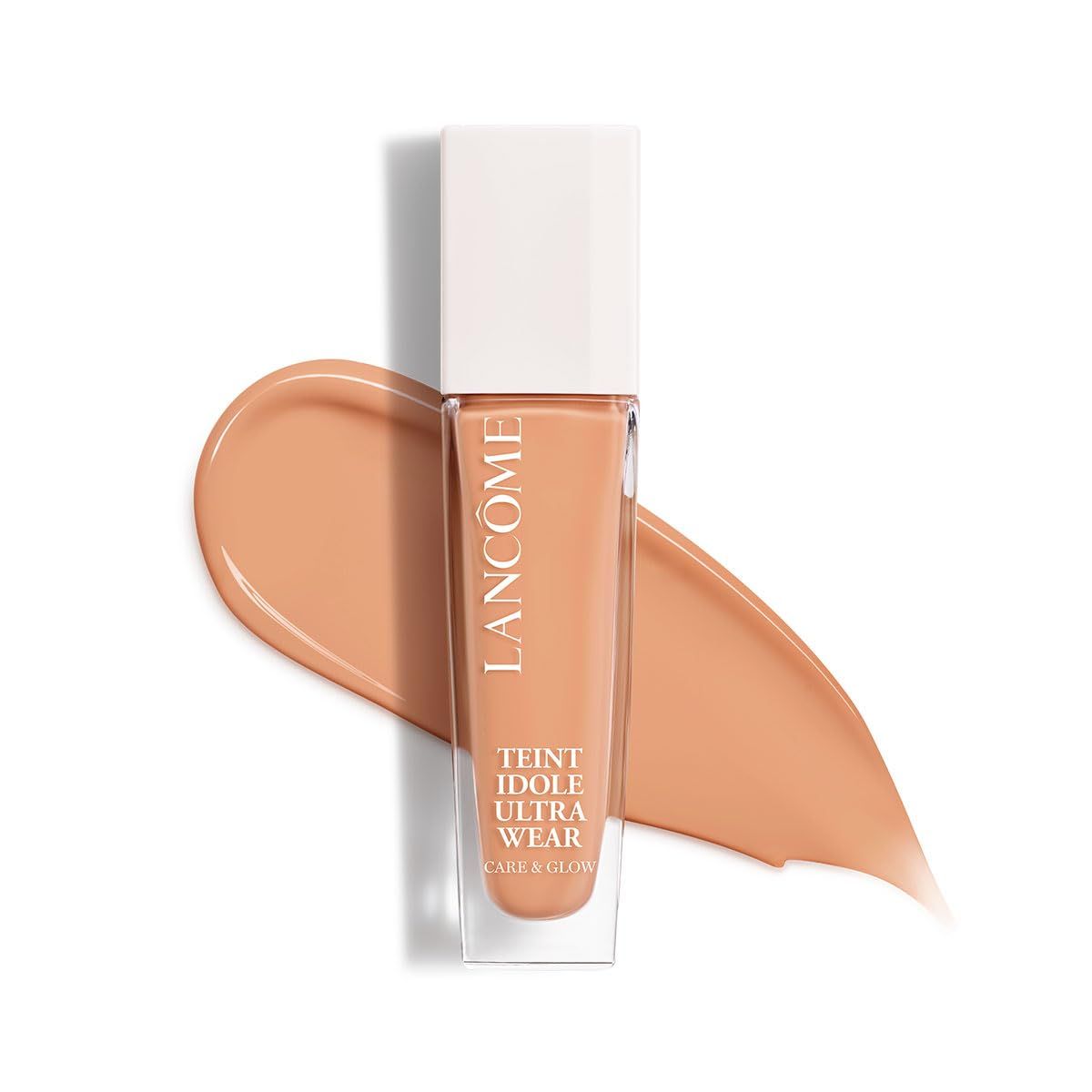 Flakon mit Make-up und Farbklecks. Aufschrift: Lancôme, Teint Idole Ultra Wear Care & Glow.