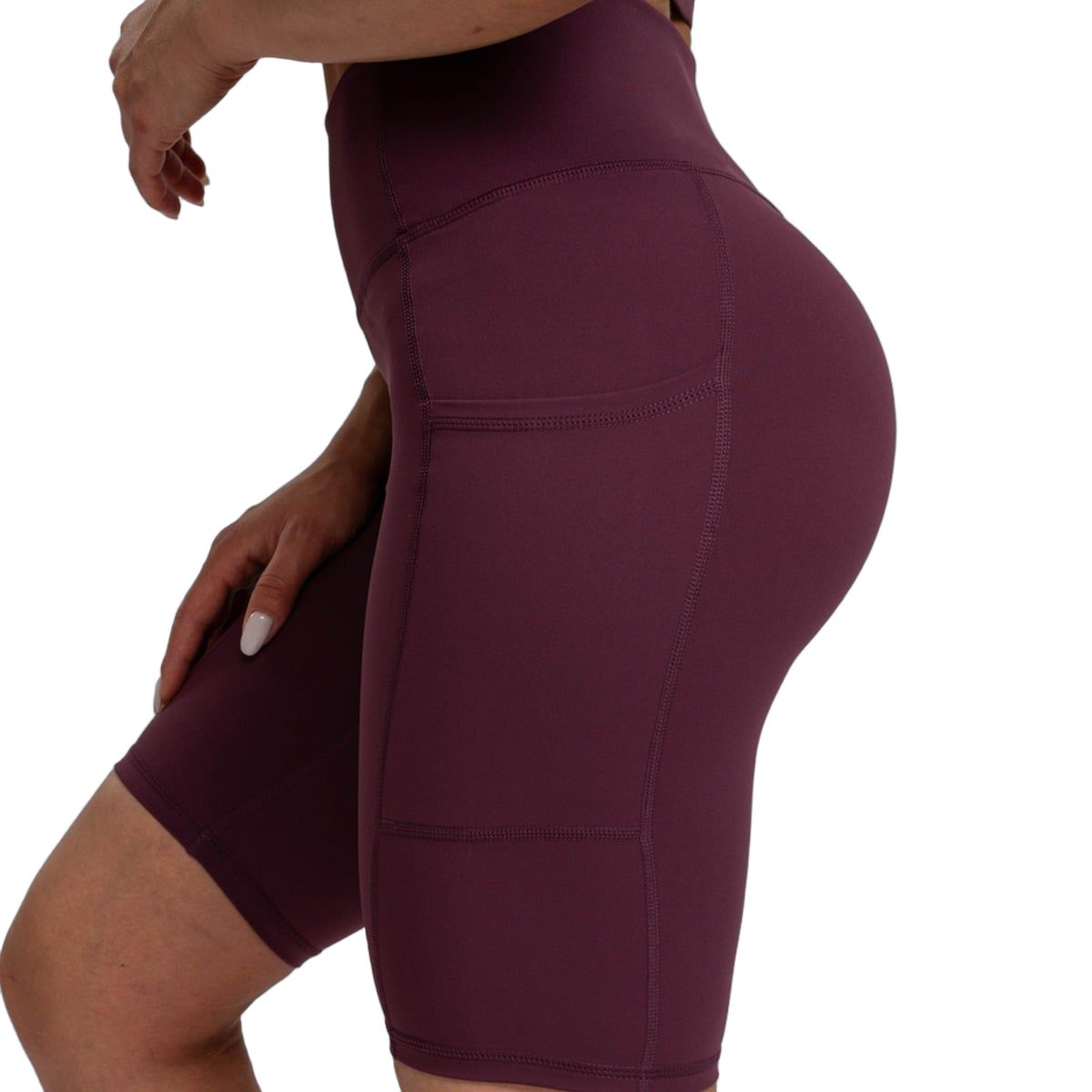 Damen Biker Shorts in Dunkelrot, Seitenansicht mit hoher Taille und Taschen.