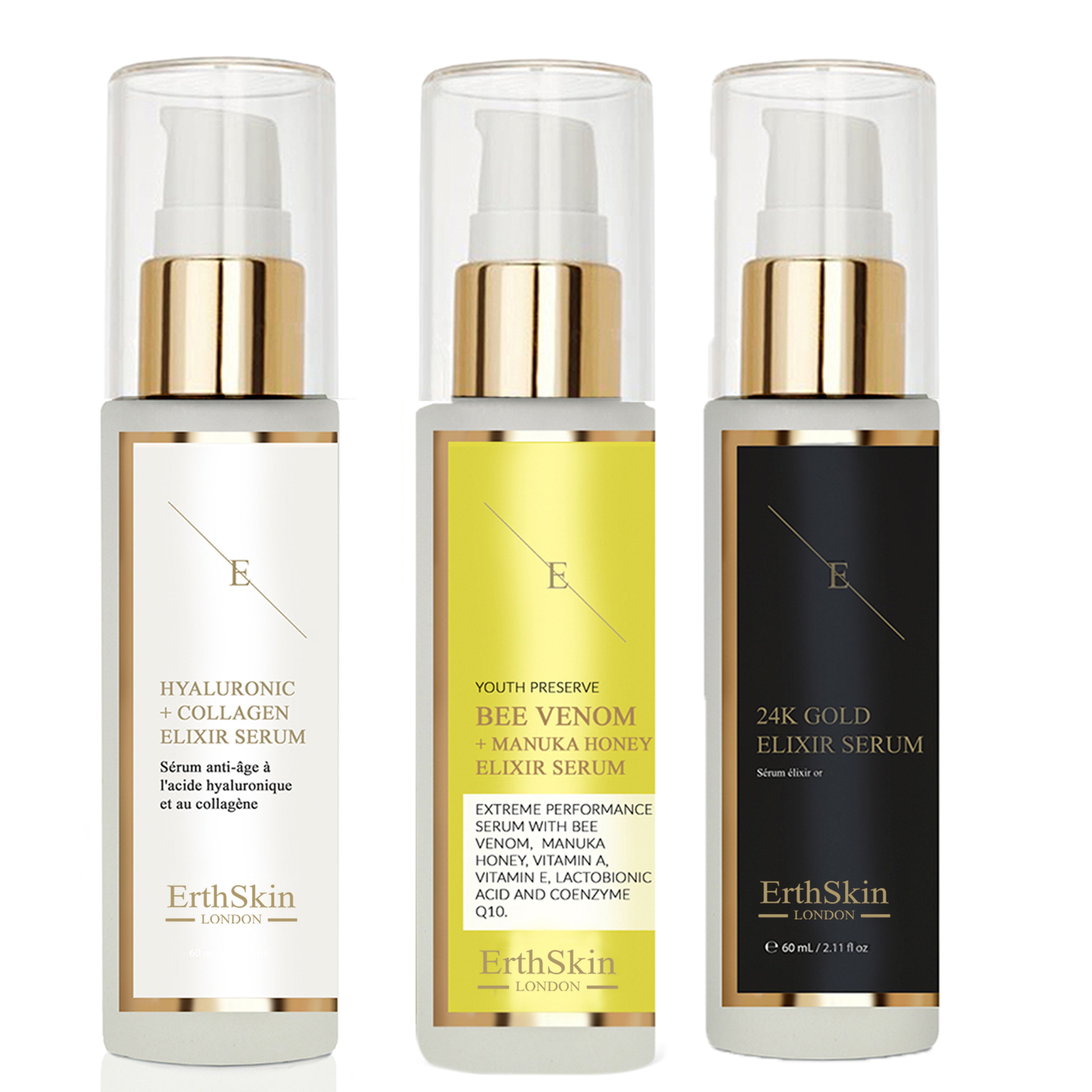 Drei Flaschen ErthSkin London Elixier Serum. Jede Flasche hat einen goldenen Deckel und eine transparente Kappe. Beschriftungen in Englisch und Französisch.