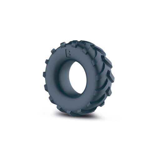 Grauer Cockring in Reifenform. Mit Profil und dem Buchstaben 'B'.