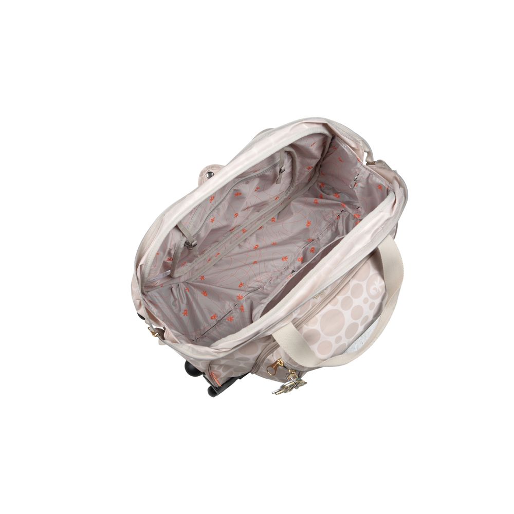 Reisetasche, beige mit Punkten. Innenfutter mit Muster. Offene Tasche, Reißverschluss.