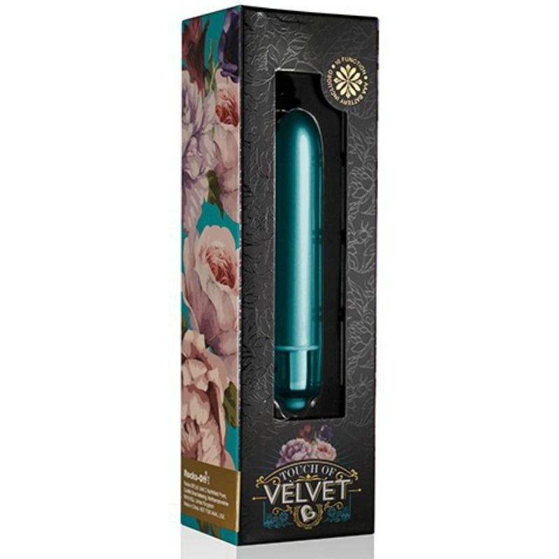Türkisfarbener Vibrator in einer schwarzen Schachtel mit floralem Muster und Produktnamen. Sichtfenster.