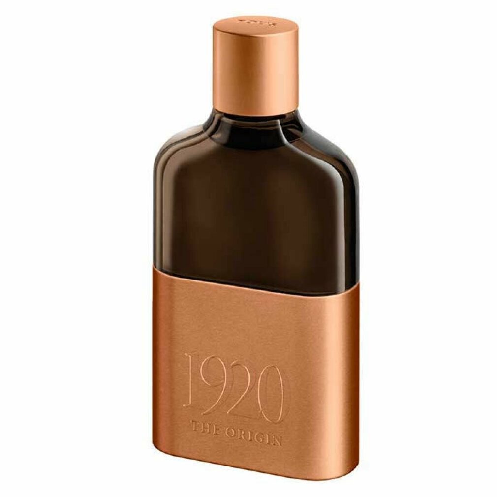 Parfümflasche. Flasche mit kupferfarbenem Boden und Deckel, dunklem Glas. Goldfarbener Text auf der Flasche.