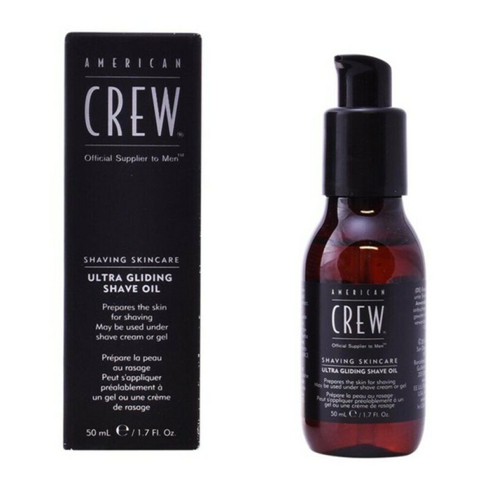 Braune Flasche mit schwarzem Pumpkopf und Karton. Aufschrift: Ultra Gliding Shave Oil. 50 ml.