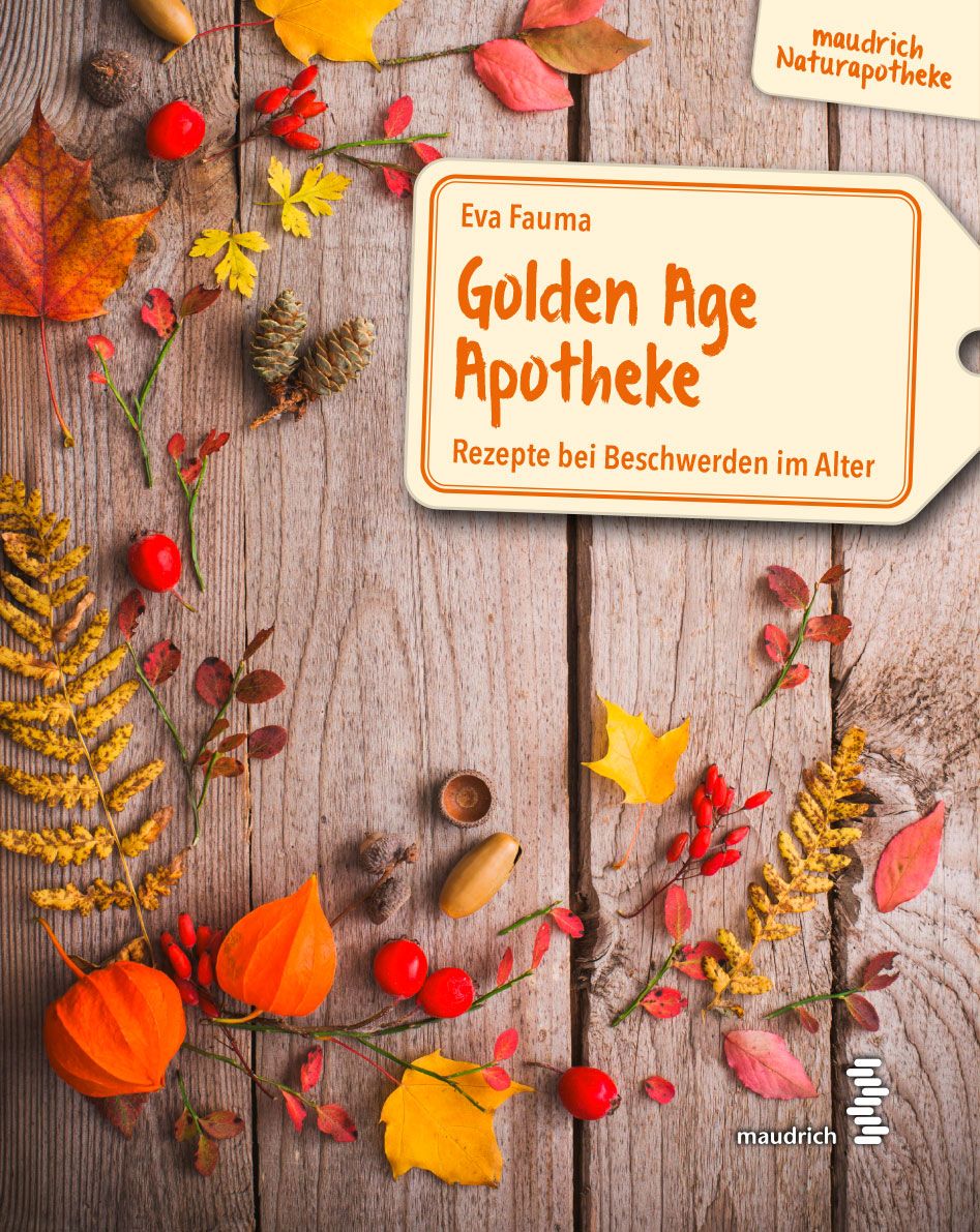 Buchcover mit Titel Golden Age Apotheke, Autorin Eva Fauma. Auf Holzgrund mit Herbstdekoration.