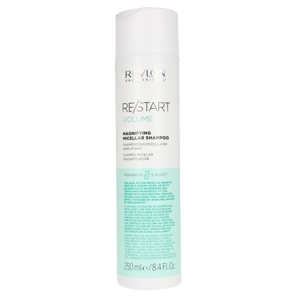 Weiß-grüne Shampoo-Flasche. Aufschrift: RE/START Volume, Magnifying Micellar Shampoo. 250ml/8.4 Fl. Oz.
