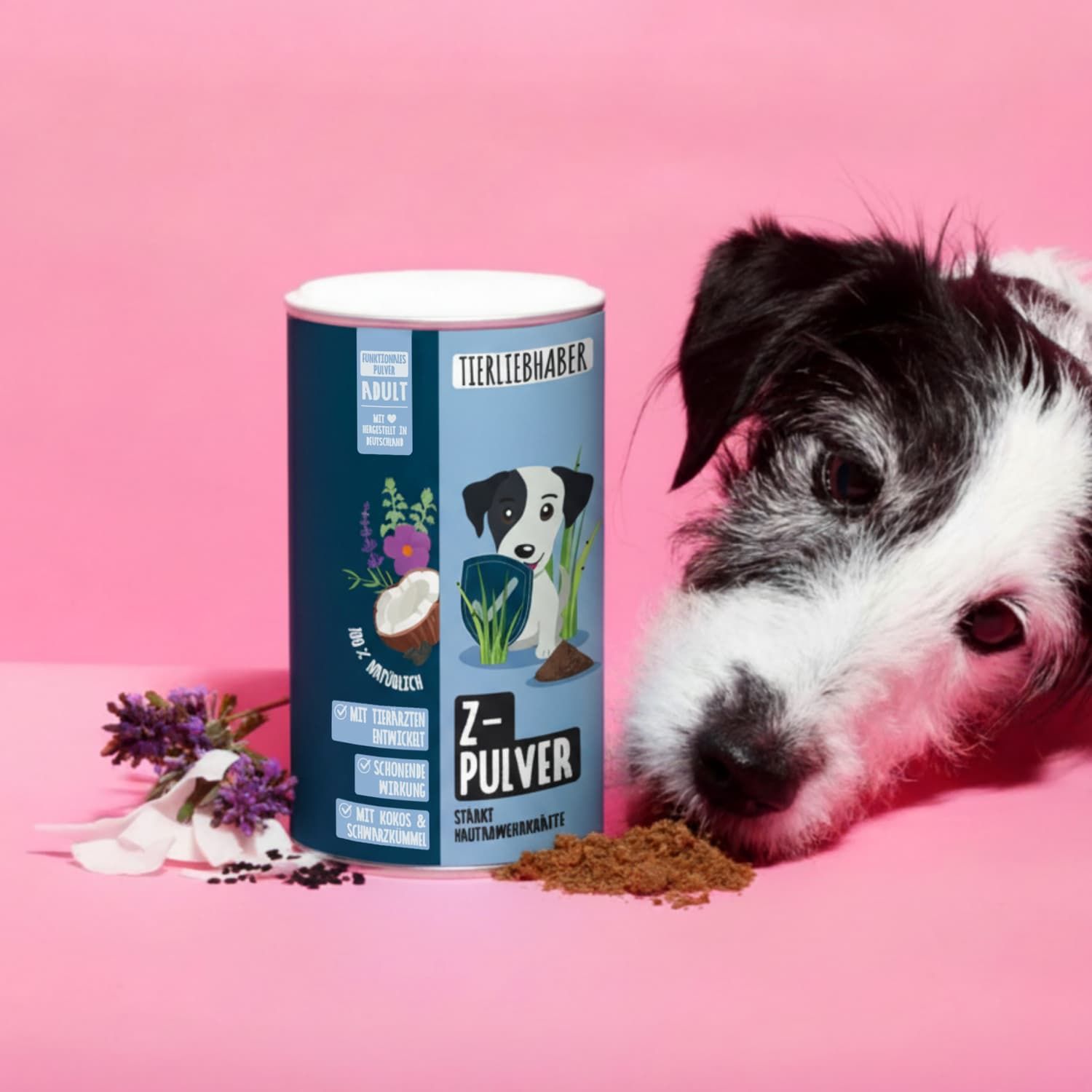 Zylinderdose mit Produktaufdruck, daneben Hund. Dose mit "TIERLIEBHABER Z-PULVER". Aufdruck mit Kokos, Kräutern und Hund.