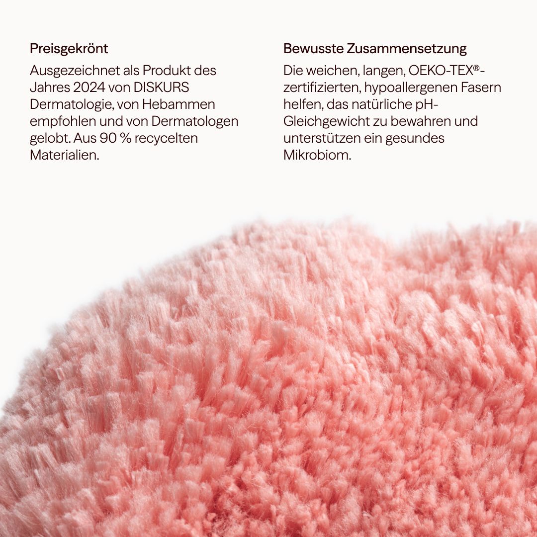 Rosa Intimwaschpad, flauschig, aus recyceltem Material. Text: Ausgezeichnet als Produkt des Jahres 2024. Oeko-Tex zertifiziert.