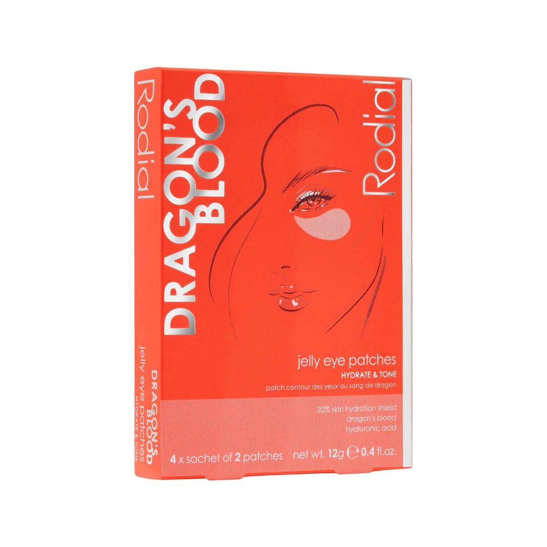 Rote Schachtel mit Produktname und Abbildung. Enthält 4 Sachets mit Augen-Gelpads. Text: Dragon's Blood, Rodial.