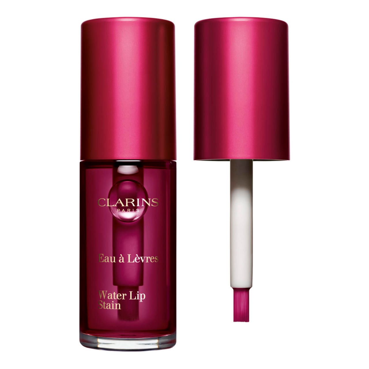 Clarins Eau à Lèvres. Flasche mit rosafarbenem Inhalt und Deckel. Deckel abgenommen, Applikator sichtbar.