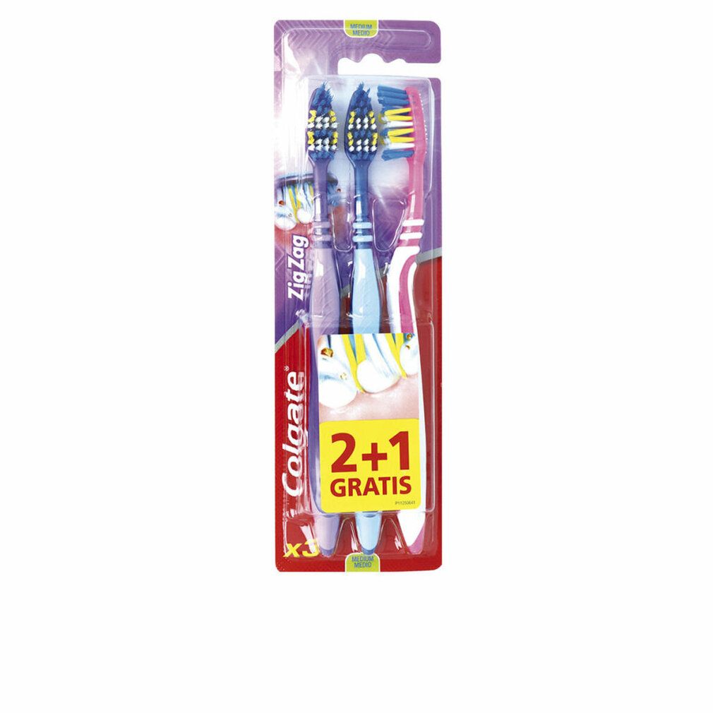 Zahnbürsten-Packung mit drei Colgate Zig Zag Bürsten. Farben: blau, gelb, pink. 2+1 Gratis-Angebot. Sichtbare Marke und Produktname.