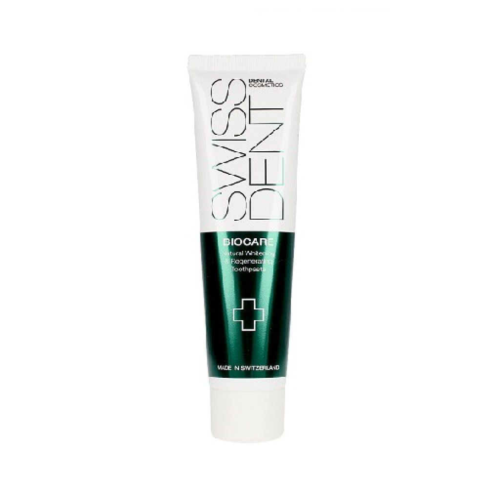 Zahncreme-Tube Swissdent Biocare. Weiß, grün, mit Logo und Kreuz. Hergestellt in der Schweiz.