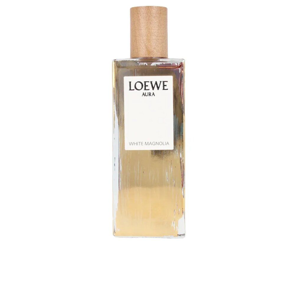 Rechteckiger Flakon mit Holzverschluss. Auf weißem Etikett: LOEWE AURA, WHITE MAGNOLIA. Goldfarbene Flüssigkeit sichtbar.