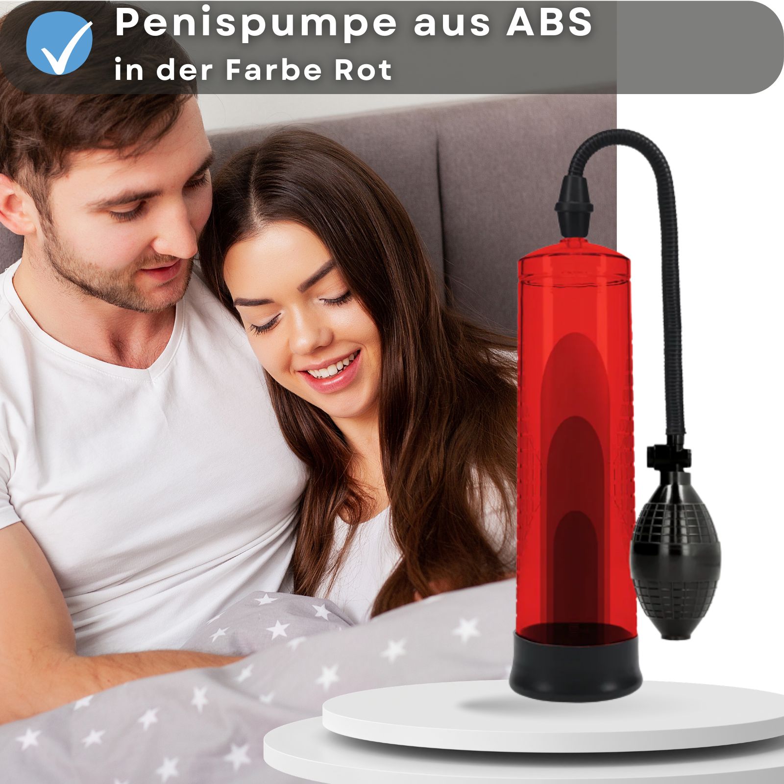 Roter Zylinder, schwarzer Schlauch und Pumpball. Paar im Bett.